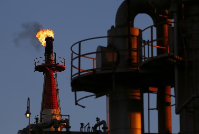 Oil prices climb on easing China COVID-19 curbs, concerns over U.S. storm impact By Reuters
