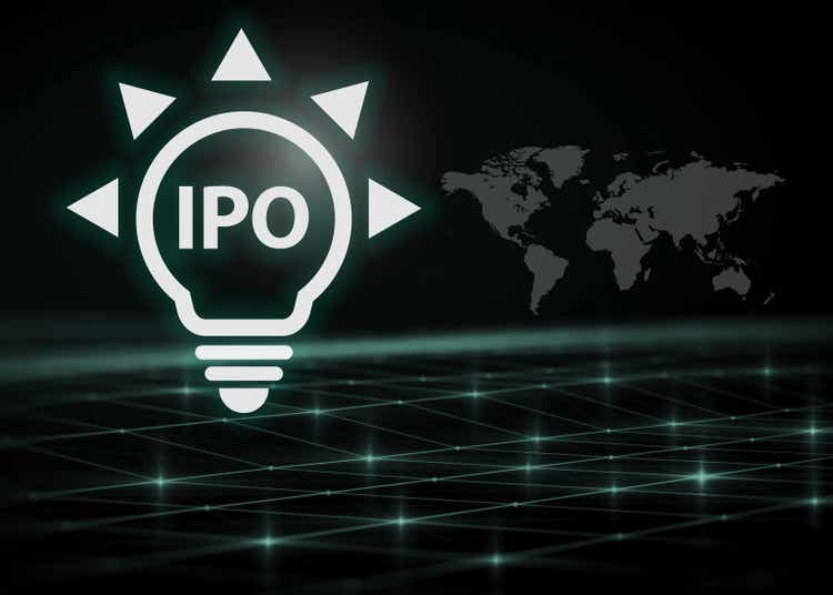 digital light bulb with IPO text on black background, trading, business and finance screen